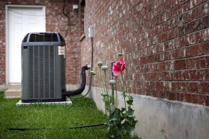 How to Determine the Perfect AC Size for Your Missoula, Home. A new AC unit outside of a home.